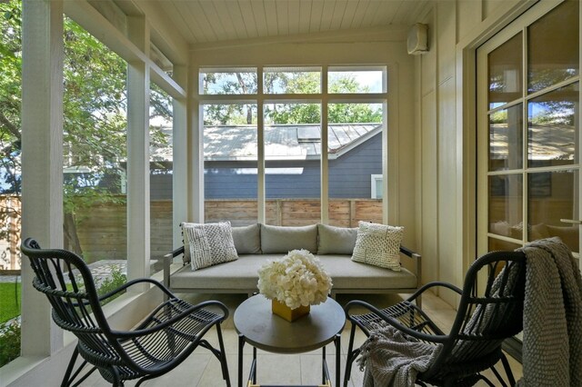 sunroom / solarium with vaulted ceiling