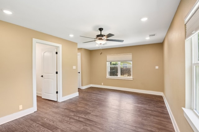 unfurnished room with ceiling fan and hardwood / wood-style floors