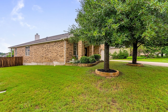 exterior space featuring a front yard