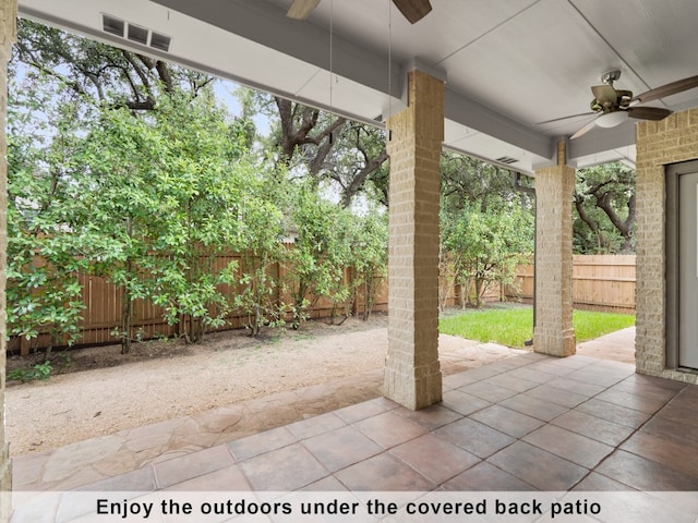 view of patio featuring ceiling fan