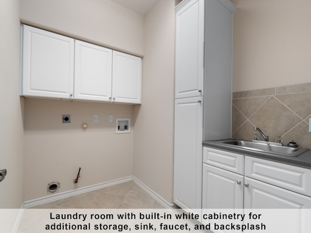 laundry room featuring light tile patterned flooring, hookup for a gas dryer, sink, cabinets, and washer hookup