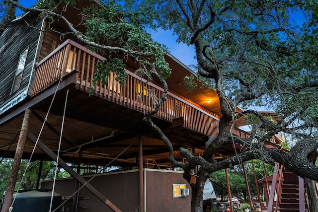 view of side of property featuring a deck