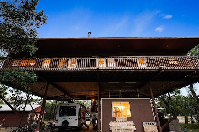 rear view of property with a deck