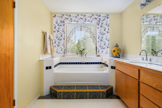 bathroom featuring vanity and a bathing tub