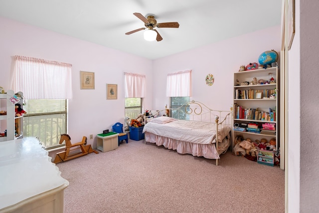 bedroom featuring carpet floors and ceiling fan