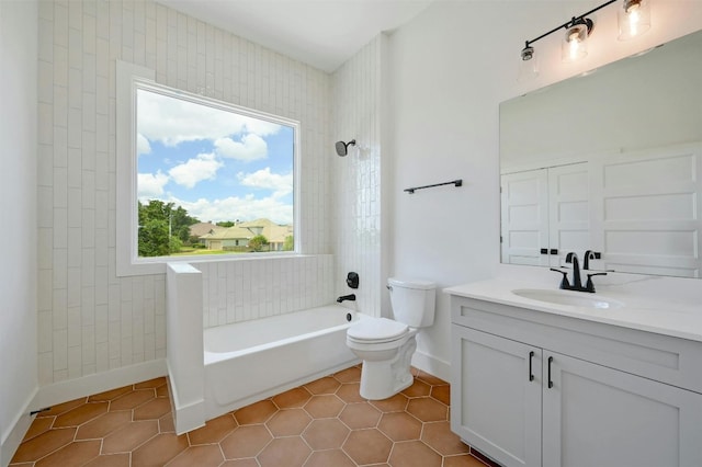 full bathroom featuring vanity, tile patterned flooring, toilet, and a wealth of natural light