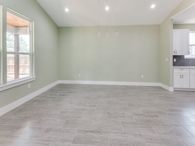 empty room featuring light tile patterned flooring