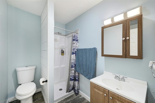 bathroom with vanity, wood-type flooring, a shower with curtain, and toilet