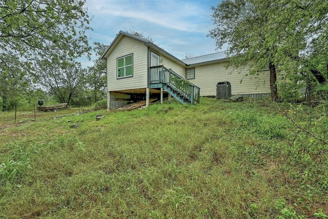 back of property with central AC unit