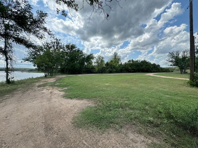 view of yard with a water view