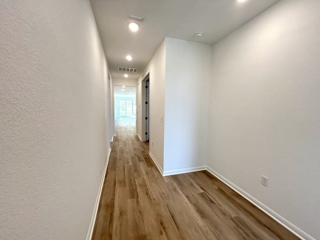 hallway featuring light hardwood / wood-style floors