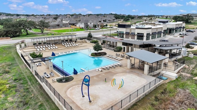 view of pool featuring a patio area and an outdoor bar