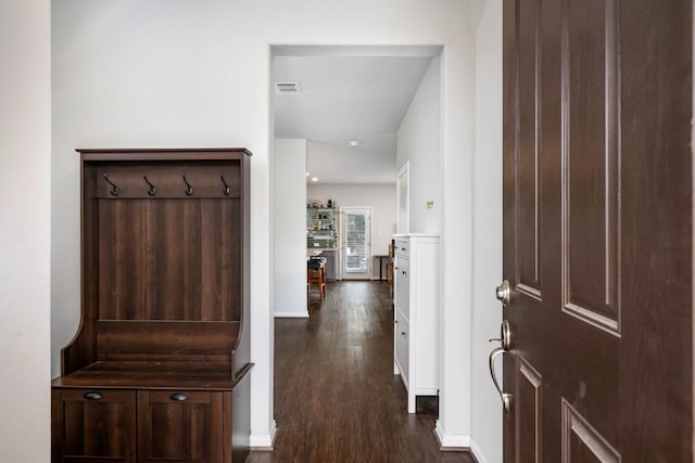 interior space with dark hardwood / wood-style flooring