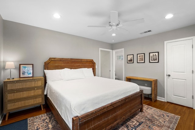 bedroom with ceiling fan and dark hardwood / wood-style floors