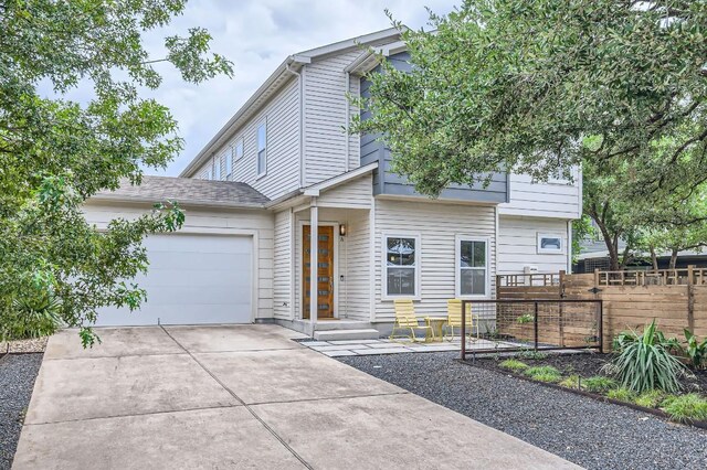 view of front of property featuring a garage