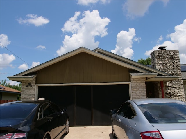 view of property exterior with a garage