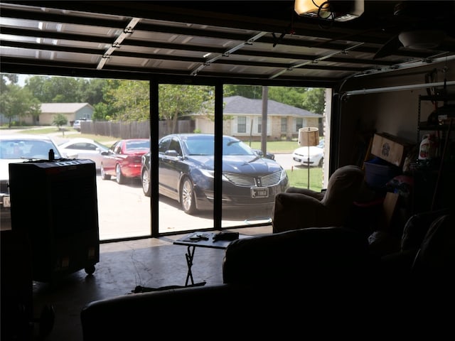 garage with a carport and a garage door opener