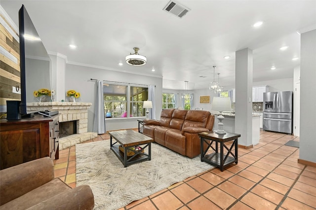 living area with recessed lighting, visible vents, crown molding, and light tile patterned floors