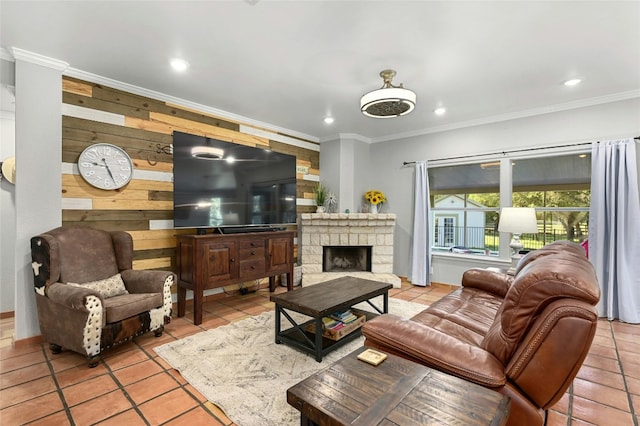 living area featuring light tile patterned floors, crown molding, and a stone fireplace