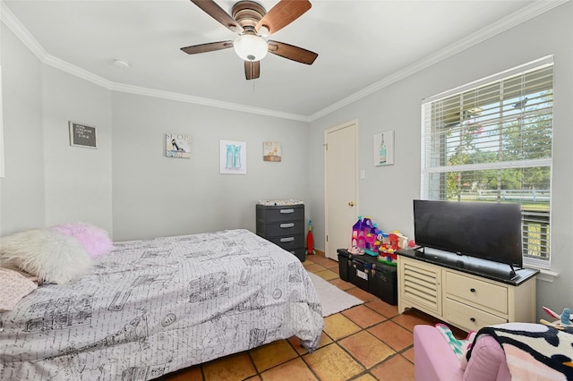 bedroom with light tile patterned floors, ornamental molding, and a ceiling fan