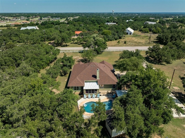 drone / aerial view with a view of trees