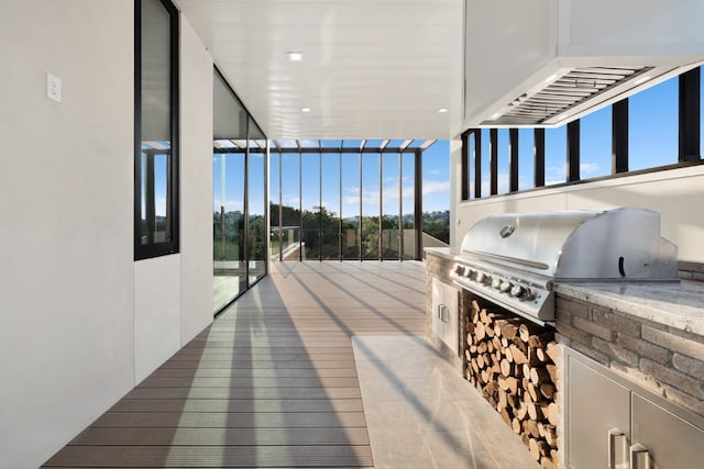 view of patio with a grill and exterior kitchen