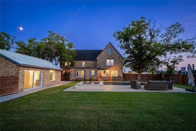 back of house with a patio, a yard, fence, and an outdoor living space