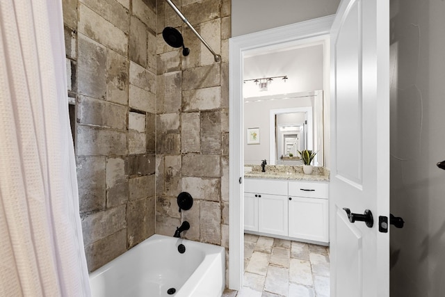 bathroom featuring vanity and shower / bath combo with shower curtain