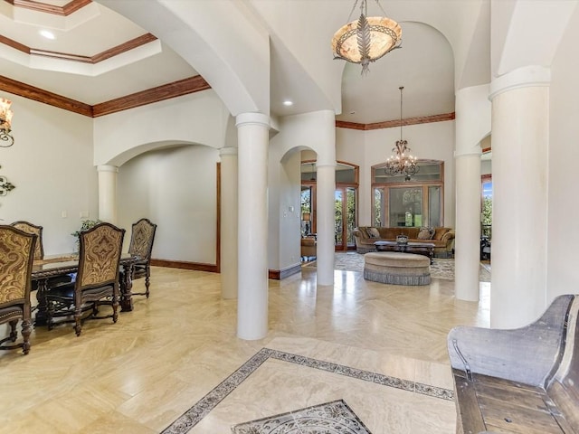 6000 Lantern View Dr, Jonestown, TX 78645 - entrance foyer featuring a chandelier, plenty of natural light, arched walkways, a towering ceiling, and ornate columns