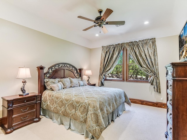 carpeted bedroom with ceiling fan