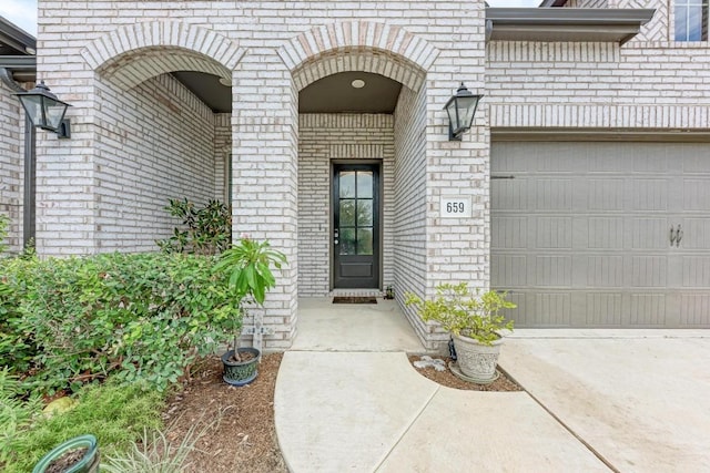 property entrance with a garage