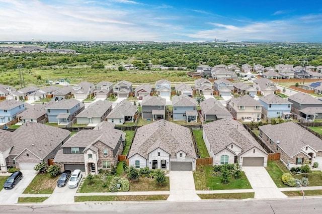 birds eye view of property with a residential view