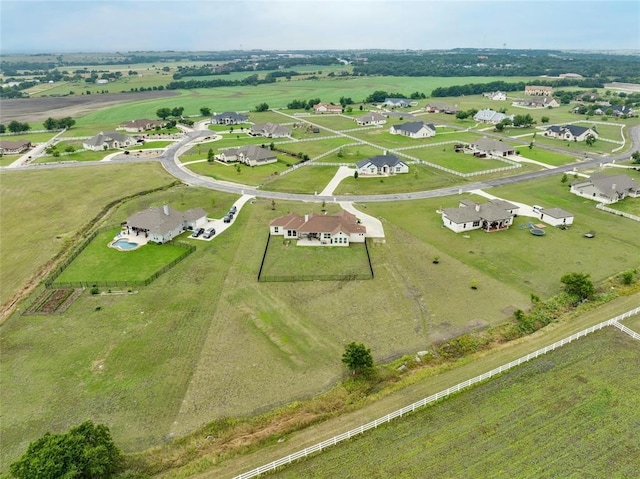 birds eye view of property featuring a rural view