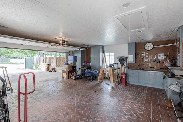 garage featuring a garage door opener