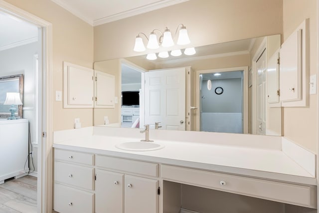 bathroom with vanity, wood-type flooring, and ornamental molding