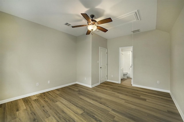 unfurnished bedroom with wood-type flooring, lofted ceiling, ensuite bath, and ceiling fan