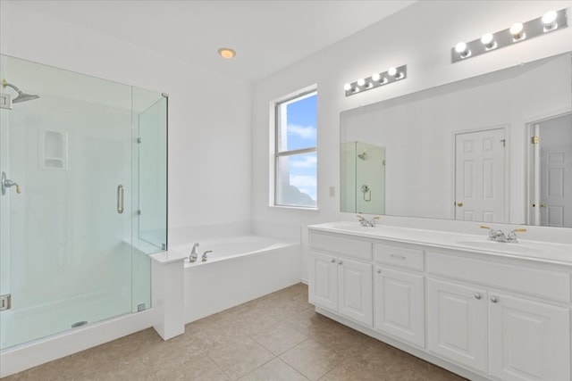 bathroom featuring vanity, shower with separate bathtub, and tile patterned flooring