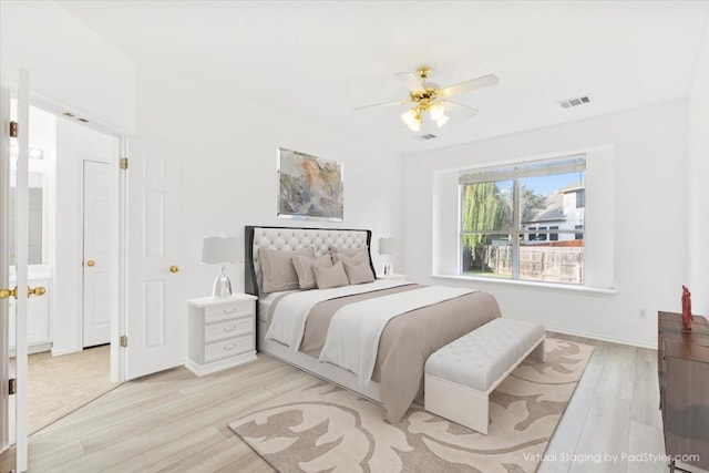 bedroom featuring light wood-type flooring and ceiling fan