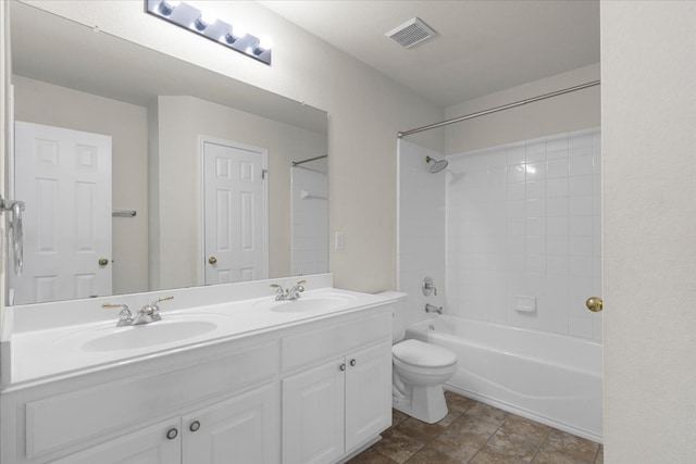 full bathroom featuring shower / bath combination, toilet, and vanity