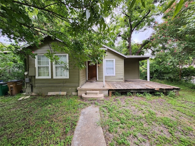 view of front of house with a wooden deck