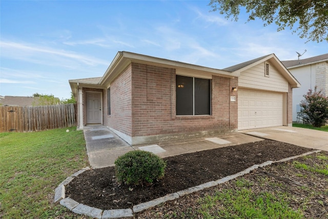 ranch-style home with a garage and a front yard