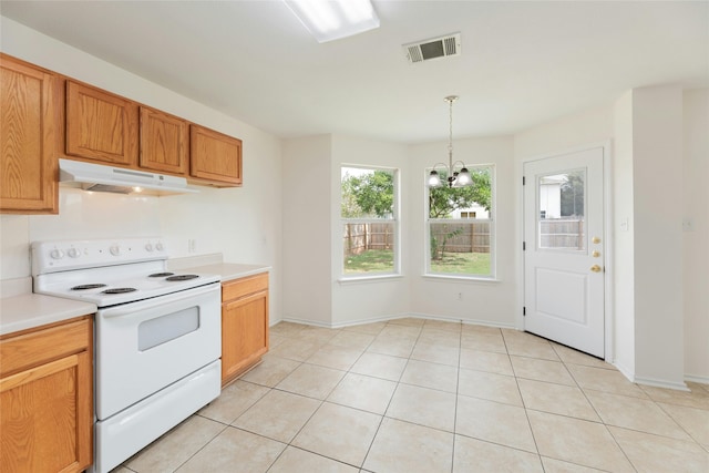 kitchen featuring white range with electric stovetop, a notable chandelier, light countertops, visible vents, and under cabinet range hood