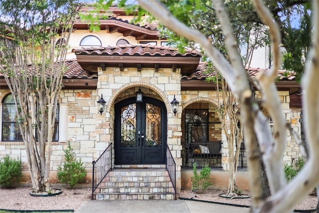 doorway to property with french doors