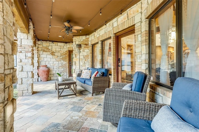 view of patio with ceiling fan