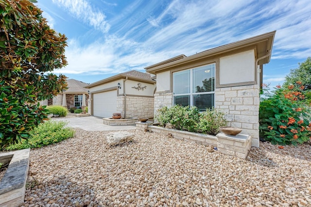 ranch-style home with a garage