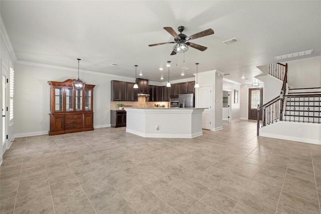 kitchen featuring light tile patterned flooring, dark brown cabinets, ceiling fan, an island with sink, and stainless steel refrigerator with ice dispenser