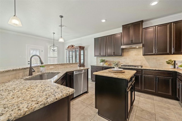 kitchen featuring a center island, sink, pendant lighting, and stainless steel appliances