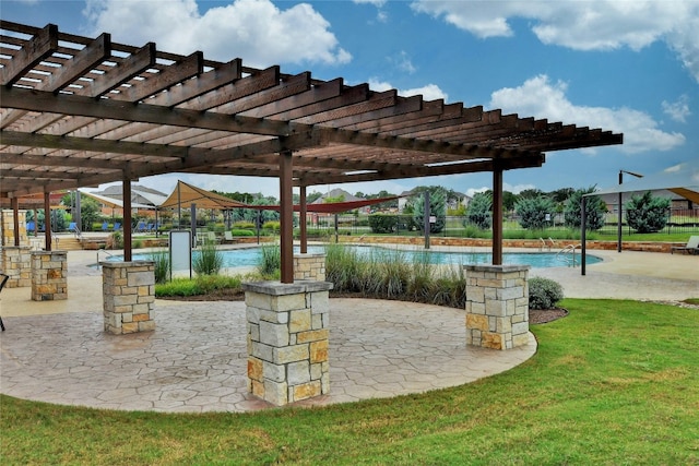 exterior space with a pergola and a community pool