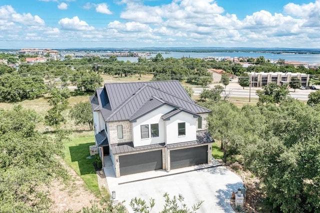 drone / aerial view featuring a water view