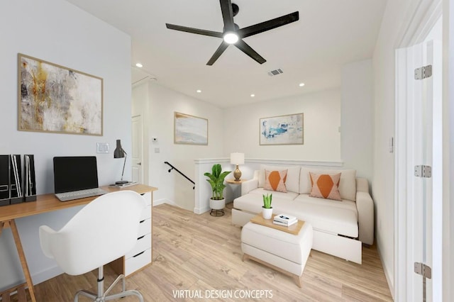 office featuring ceiling fan and light hardwood / wood-style flooring